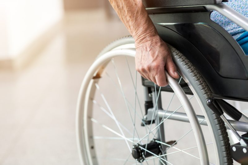 Unrecognizable,Senior,Person,Sitting,In,Wheelchair