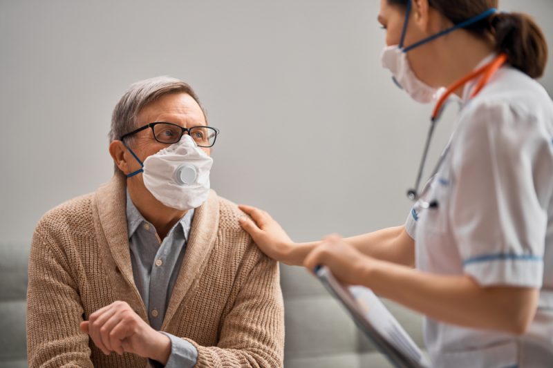 Doctor,And,Senior,Man,Wearing,Facemasks,During,Coronavirus,And,Flu
